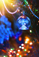 Christmas toy on a Christmas tree closeup