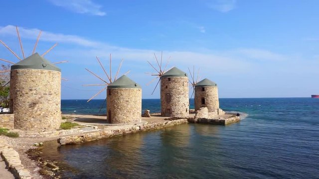Windmills near the sea in Greece (Chios) Pan technique left to right.