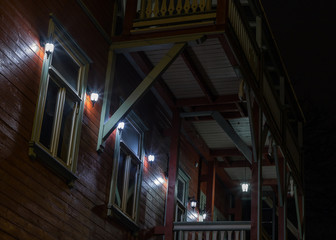 house lit with bright lights at night
