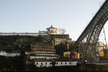 Fototapeta na wymiar Serra do Pilar e parte da ponte de Dom Luis - vista para a margem sul do rio Douro no Porto