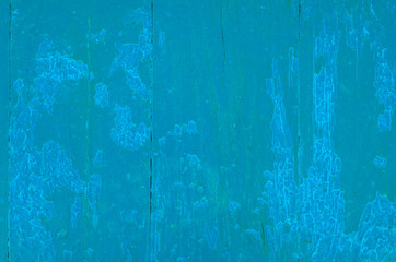 Texture background of wooden planks covered with old peeling paint