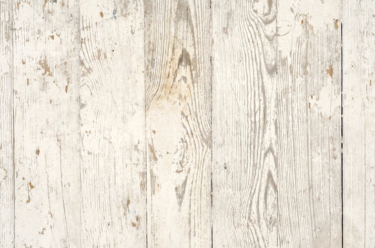 Texture background of wooden planks covered with old peeling paint