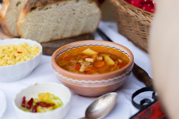 hungarian traditional food, goulash soup with fresh bread