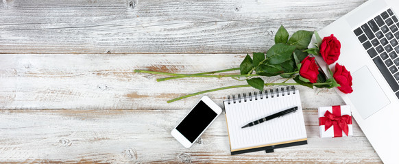 White rustic desktop with Valentines day romance concept