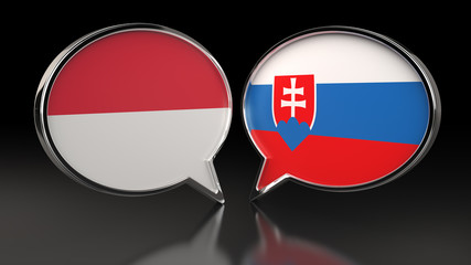 Fototapeta premium Monaco and Slovakia flags with Speech Bubbles. 3D illustration