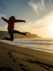 Man jumping on the beach
