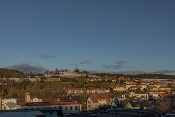 Vimperk town and block of flats in cold winter evening in sunset time