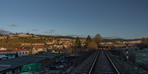 Fototapeta na wymiar Vimperk town and railway track in sunny winter afternoon