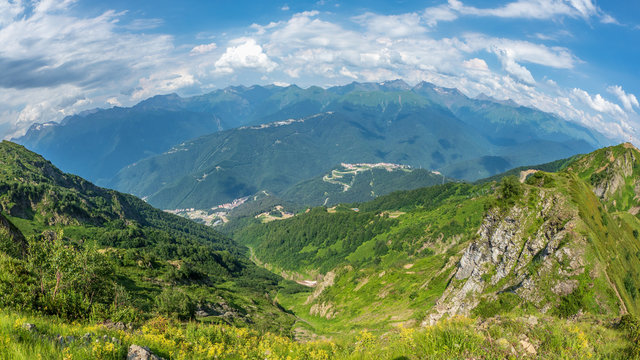 Panoramic view from the top of the aibga Ridge at the Rosa Khutor ski resort. Krasnaya Polyana, Sochi, Caucasus, Russia.