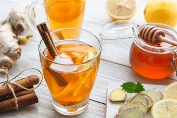Cup of ginger tea with honey and lemon.