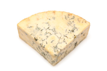 Mature blue stilton cheese isolated on a white studio background.