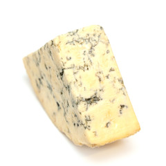 Mature blue stilton cheese isolated on a white studio background.