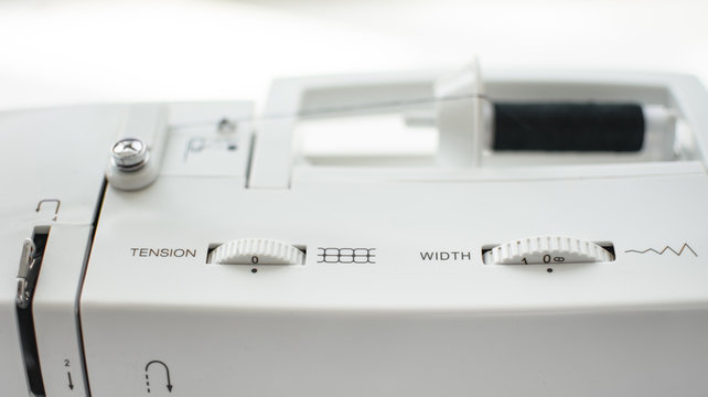 Sewing machine closeup tension high