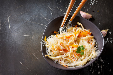Asian food, Funchoza salad with  stir fry Squids and Vegetables. Copy space.