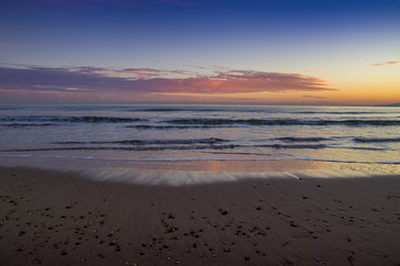 Fototapeta na wymiar Coastal holiday resort beach sunset