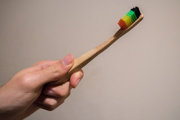 Bamboo Toothbrush Ethical Brush Holding In Hand