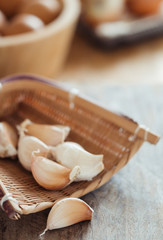 Garlic cloves in wicker basket