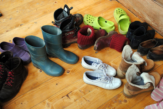 Bright shoes are on the doorstep of the house - Powered by Adobe