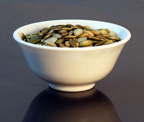 Bowl with a pumpkin seads