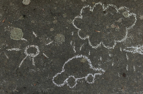 Chalk doodles on concrete 