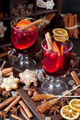 Winter  hot drink with spices and tasty cookies