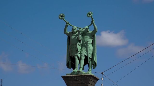 Monument trumpeter with lures. Copenhagen. Denmark. 4K.