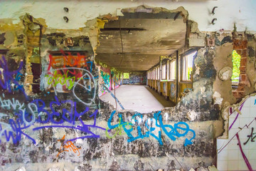 Graffiti wall brake through