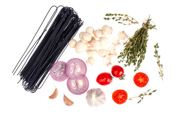 Pasta, vegetables, herbs, spices for cooking isolated on white background
