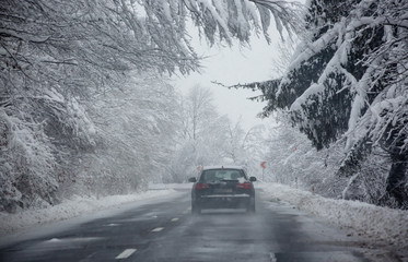 snow covered winter dangerous road