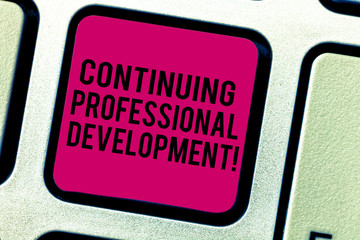 Fototapeta premium Text sign showing Continuing Professional Development. Conceptual photo Maintaining and enhancing the knowledge Keyboard key Intention to create computer message pressing keypad idea