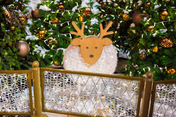 reindeer and christmas tree on a background