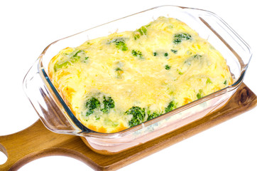 Omelette of eggs, broccoli, cheese in glass heat-resistant form, baked in oven