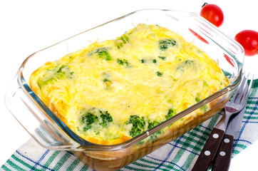 Omelette of eggs, broccoli, cheese in glass heat-resistant form, baked in oven