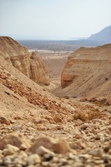 Hiking path at Qumran caves in Qumran National Park, where the dead sea scrolls were found, Judean desert hike, Israel