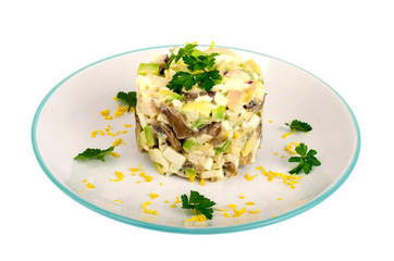 Salad with chicken and avocado on plate isolated on white background