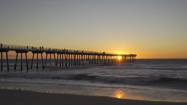 A Beach Pier at Sunset in 4K (motion zoom in)
