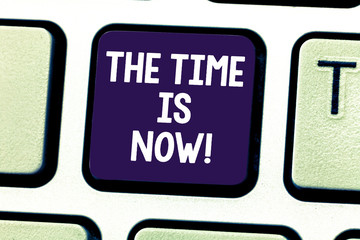 Word writing text The Time Is Now. Business concept for Encouraging someone to start doing today not tomorrow Keyboard key Intention to create computer message pressing keypad idea