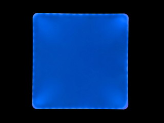 Square luminaire with uneven cross-shaped illumination. Glowing square in the dark.