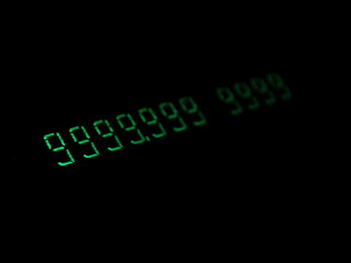 Green numbers in the dark. Old electronic numeric display. Hacking