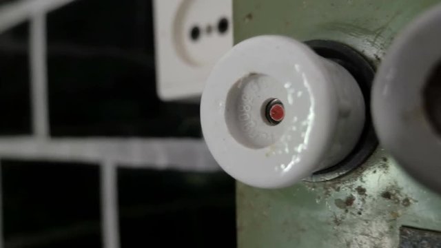 The ceramic fuses on old switchboard
