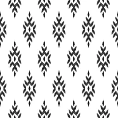 Behang Etnische naadloze patroon. Boho ikat sieraad. Kan worden gebruikt voor textiel, behang, inpakpapier, wenskaartachtergrond, telefoonhoesje afdrukken. Zwart-wit vectorillustratie. Stammen grafisch ontwerp. © aunaauna