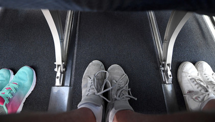 Interior view of the legroom on a commercial airplane.