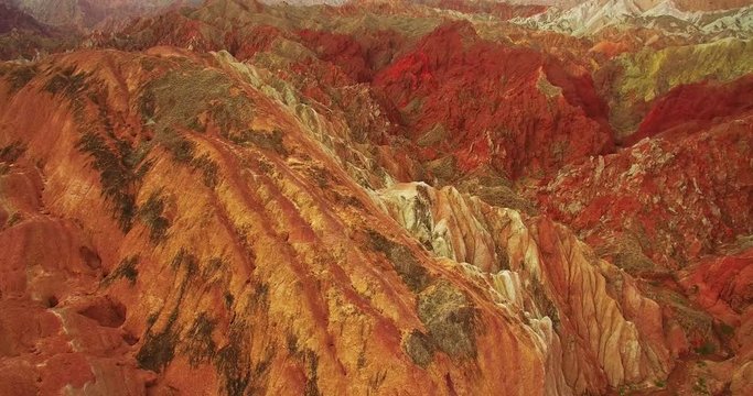 aerial view of colorful Danxia landform in Zhangye Danxia National Geological Park of China, 4k