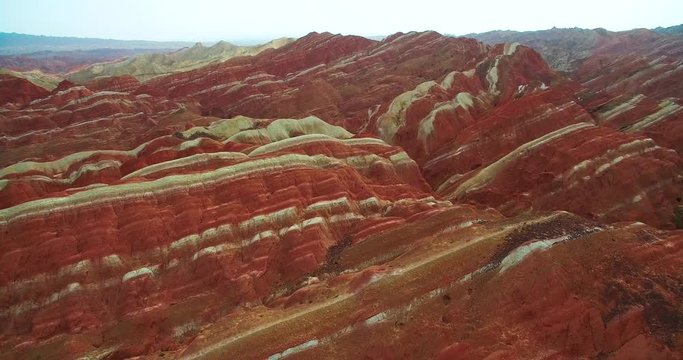 aerial view of colorful Danxia landform in Zhangye Danxia National Geological Park of China, 4k