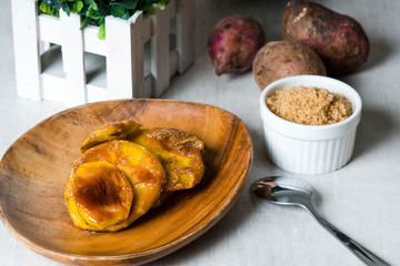 caramelized sweet potato or also known as kamotecue.  Favorite snacks of Filipino people