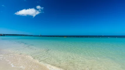 Photo sur Plexiglas Plage de Seven Mile, Grand Cayman Smooth Tropical Water in Jamaica