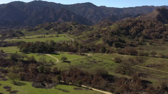 Aerial Drone Footage Pan Up and Right Towards Hills