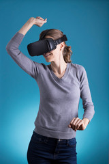 Woman using VR Virtual Reality headset