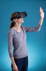 Woman using VR Virtual Reality headset