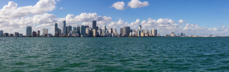 Fototapeta na wymiar Beautiful panoramic view of a modern Downtown Cityscape during a sunny evening. Taken in Miami, Florida, United States of America.